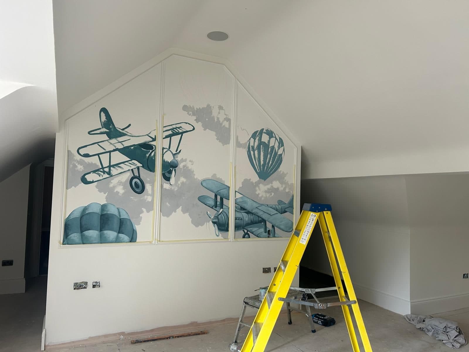 The hand-painted mural being added to the boy's bedroom