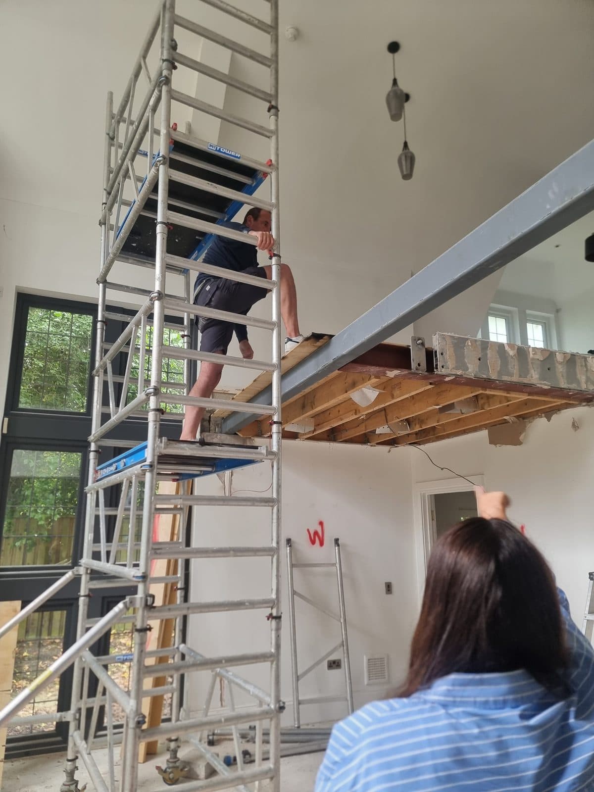 Structural work on the double-height stairwell ceiling