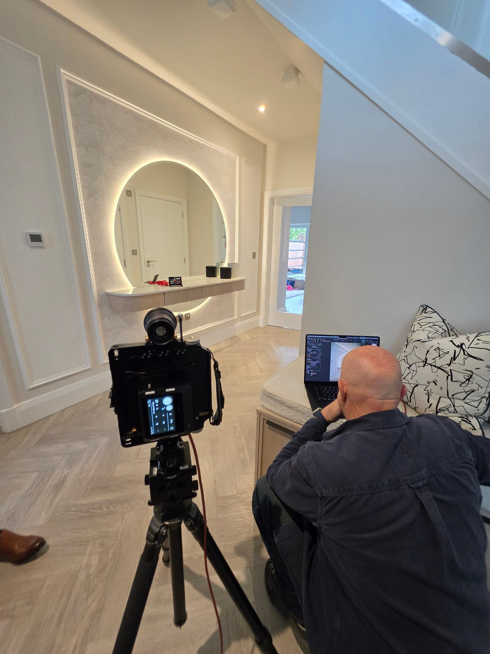 The finished Adlington Road entrance hall being photographed on shoot day