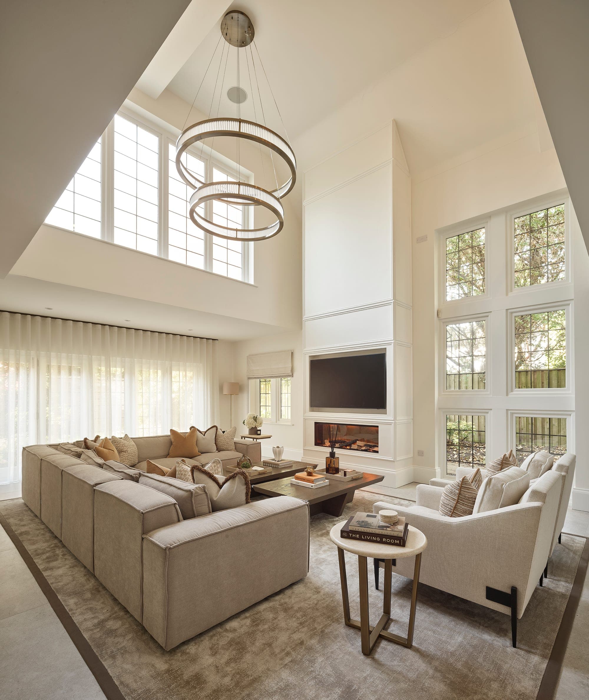 The sitting room, layered with warm, tonal furnishings