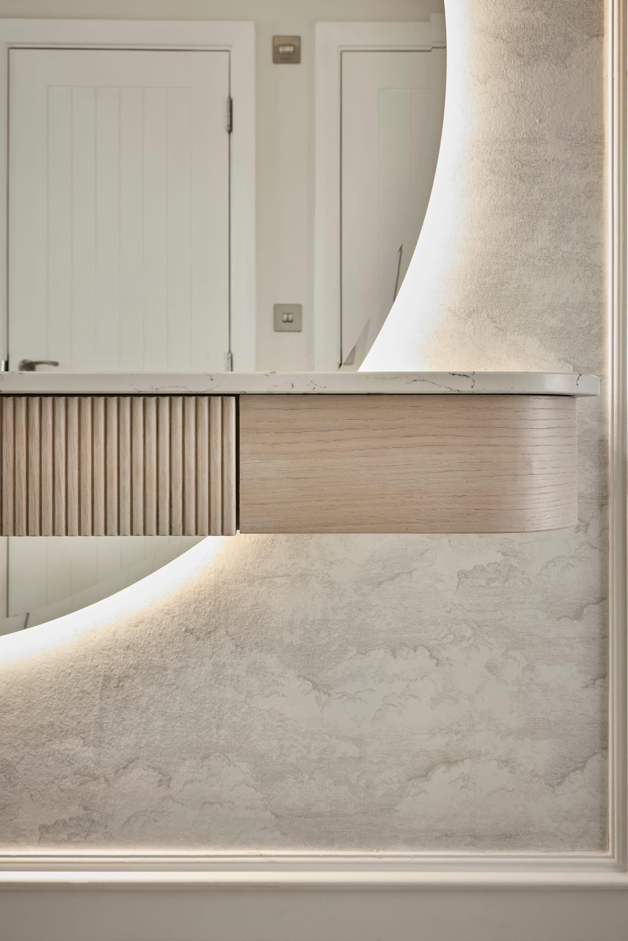 Bespoke oak joinery and marble detailing in a Wilmslow home
